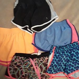 Bundle of 5 pairs sport shorts.